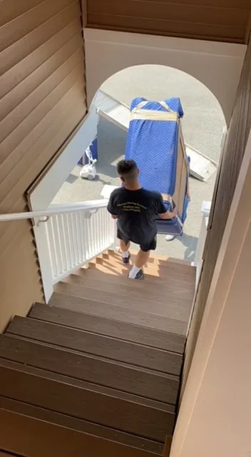 Efficient Moving Services crew carefully moving household items
